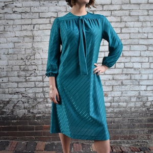 Wynette | Large | Vintage 60s - 70s Aqua/Teal Long Sleeve Tie Neck Shift Dress | 1960s Side Striped Shimmer Fabric