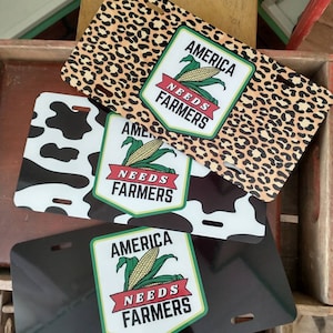 America Needs Farmers License Plate