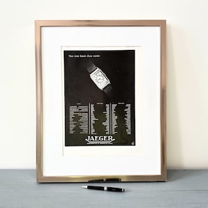 Rara stampa pubblicitaria francese d'epoca Jaeger LeCoultre, autentica e originale, regalo unico per collezionisti di orologi, decorazione d'interni glamour per gli amanti dei marchi di design.