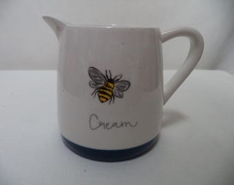 Heartland Bee Creamer white w/ blue ceramic spout handle