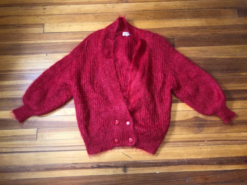 fuzzy red cardigan