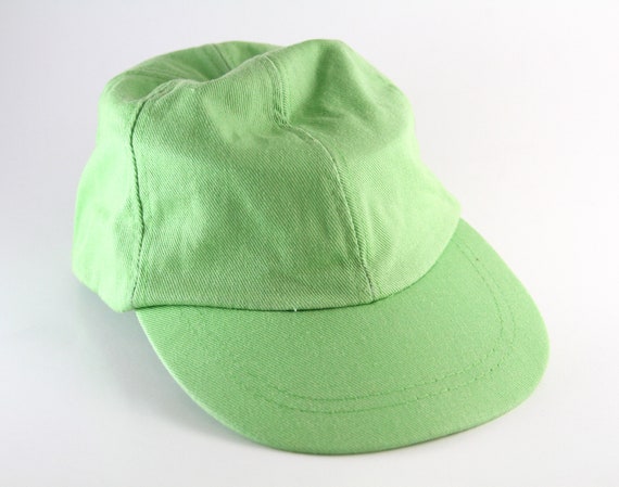 light green hat