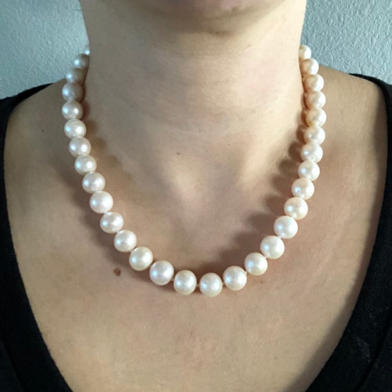 White Cultured Freshwater Pearl Necklace with 10mm Pearls Individually Knotted Sterling Silver White Cultured Freshwater Pearl Necklace with 10mm Pearls Individually Knotted Sterling Silver
