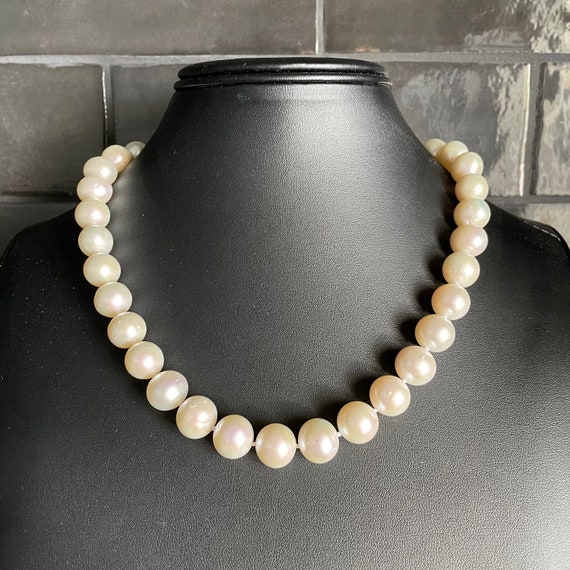 White Cultured Freshwater Pearl Necklace with 10mm Pearls Individually Knotted Sterling Silver White Cultured Freshwater Pearl Necklace with 10mm Pearls Individually Knotted Sterling Silver