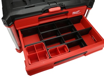 May include: A red and black toolbox with a drawer that has multiple compartments. The drawer is open and the compartments are visible. The toolbox has the Milwaukee logo on the front.