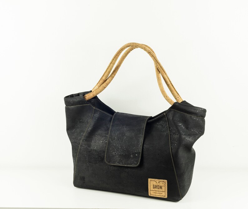 black fabric handbags