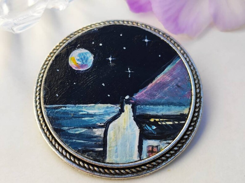 Moonlight over sea cottage by the sea Irish coast miniature image 0