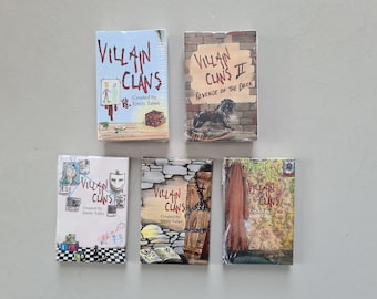 PAQUETE DE 5 mazos de clanes villanos
