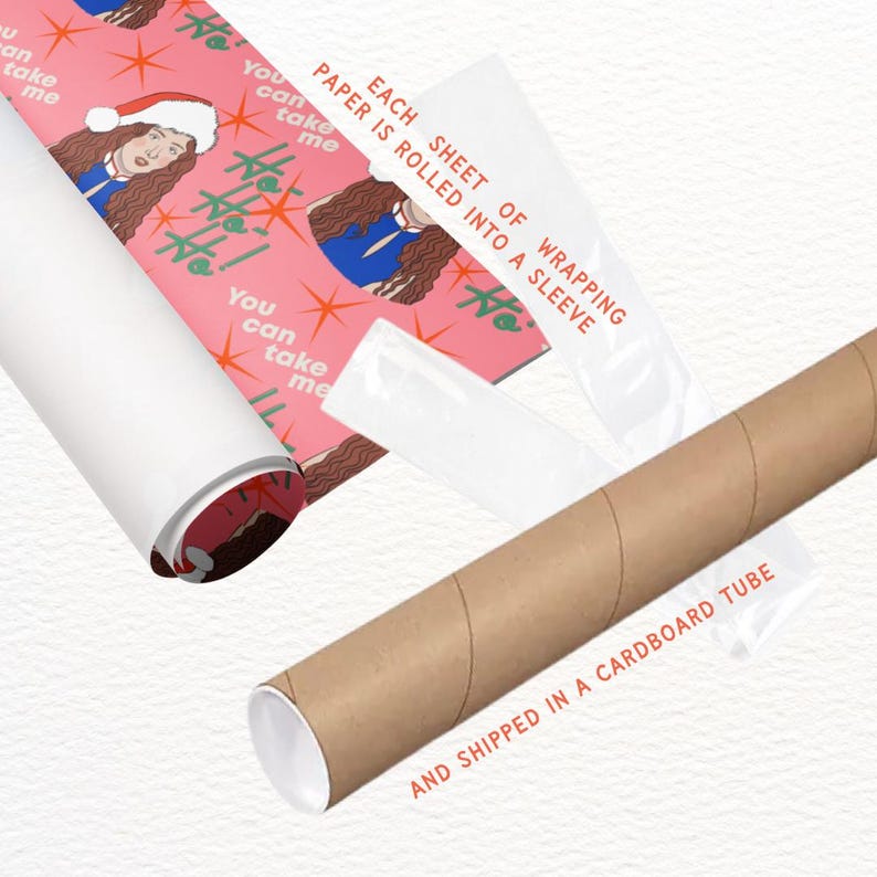 Puede incluir: Papel de regalo rosa con un patr&oacute;n repetido de una mujer con cabello largo y casta&ntilde;o que lleva una camisa azul y un gorro de Pap&aacute; Noel rojo. El texto "You can take me" se repite en el papel. El papel se enrolla en un tubo de cart&oacute;n y se etiqueta con "Each sheet of wrapping paper is rolled into a sleeve and shipped in a cardboard tube."