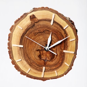 Wall clock made of natural wood