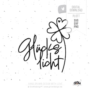 May include: A digital download graphic featuring the German words "Glücklicht" in a handwritten style, alongside a four-leaf clover illustration. The design is in black on a white background, with small black dots scattered around.