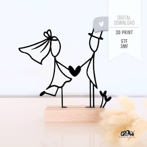 May include: A black and white stick figure wedding cake topper. The bride wears a veil and the groom a top hat, holding a heart. The wooden base supports the figures. Text reads "DIGITAL DOWNLOAD" and "3D PRINT".