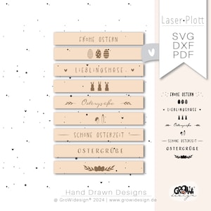 May include: Set of six printable Easter gift tags with brown text and illustrations on a light peach background. The tags feature phrases like "Frohe Ostern" and "Ostergrüße".