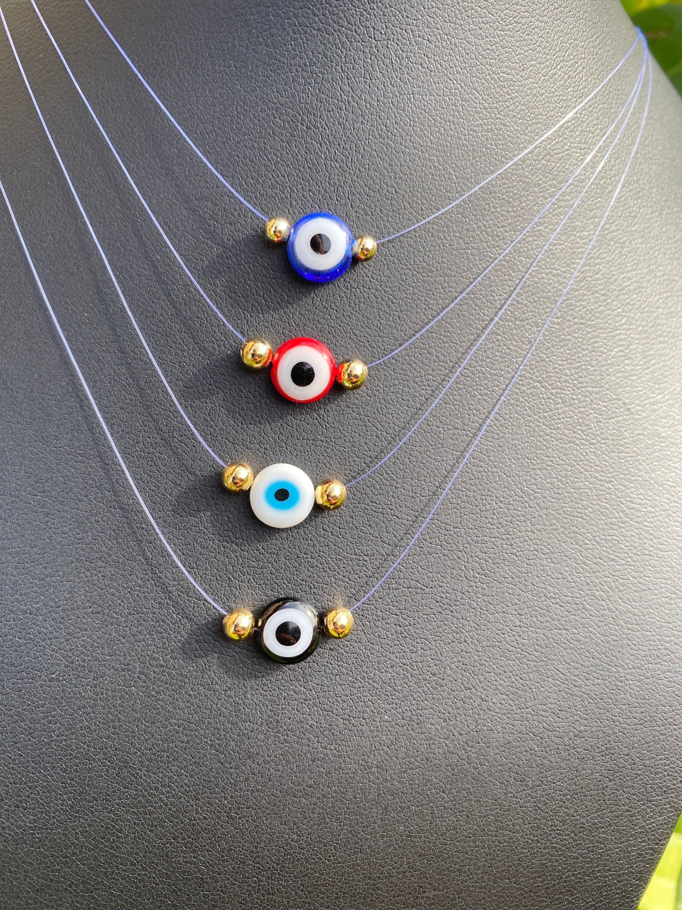 Evil Eye Floating on fine clear illusion Nylon ,  Necklace for women …