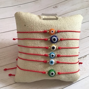 Red string evil eye bracelet/Protection /Goldfilled / evil eye / Good Luck/Availble in different colors .