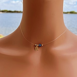 Floating on fine clear illusion nylon with evil eye • Floating Necklace • Evil eye necklace• Turkish talisman • initial minimalist necklace