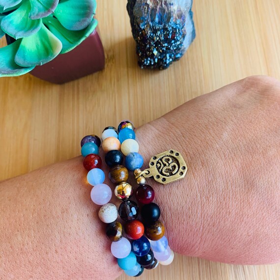 Om crystal jewelry discount