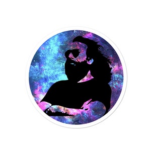 May include: Circular sticker with a black silhouette of a person wearing sunglasses, set against a colourful galaxy backdrop of blue, purple, and pink hues. The sticker has a white border.
