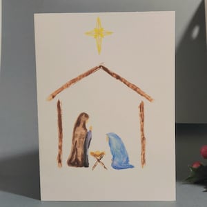 Cartão de Natal pintado à mão com doce presépio
