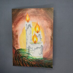 Cartão de Natal com velas brancas pintadas à mão