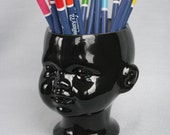 Doll head planter with open eyes black ceramic - flower vase hollow doll head