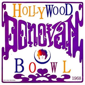 May include: A purple and white poster with the text "HOLLYWOOD DONOVAN BOWL 1968". The poster features a stylised image of a person with curly hair and a crescent moon.