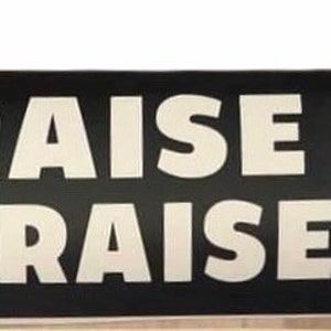 May include: Black and white sticker with the number "3" in white with a red outline and the text "RAISE HELL PRAISE DALE" in white.