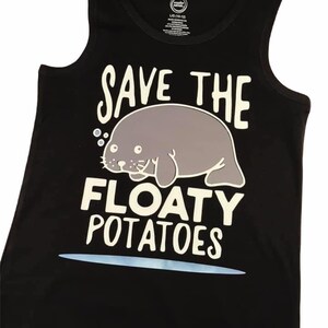 May include: Black tank top with a white graphic of a manatee with the text "Save the Floaty Potatoes".