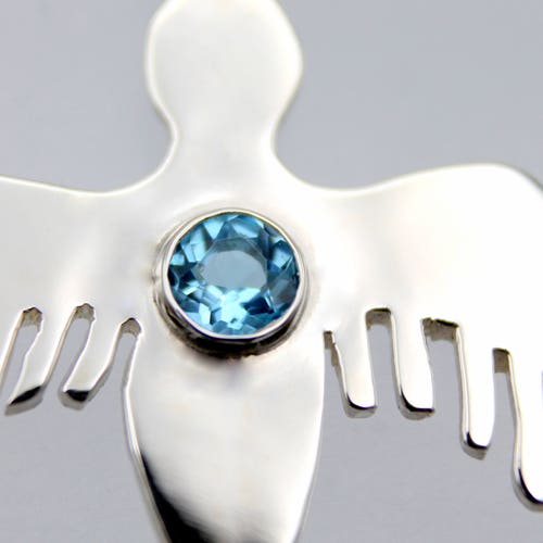 Sterling Silver Pendant with Light Blue Topaz - Araba Phoenix