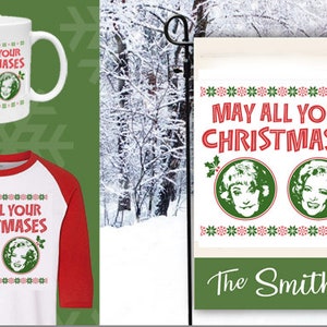 May include: A set of Christmas themed merchandise featuring a red and white baseball style shirt with the text "May All Your Christmases" and two images of women. A white mug with the same text and images. A white and green garden flag with the same text and images and the text "The Smiths" at the bottom.