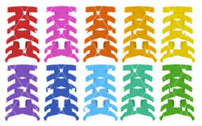 May include: Set of ten colorful plastic hair clips in various shades of red, pink, orange, yellow, purple, blue, teal, light blue, green, and lime green. The clips are all the same shape and size, with a zig-zag design.