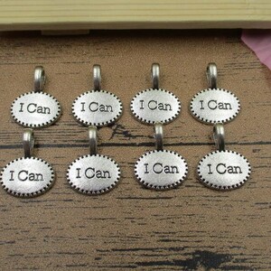 20 I Can-bedels, antiek zilverkleurig, ovaal label met letters-RS460