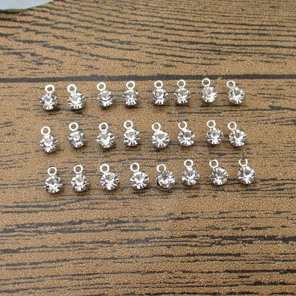 50 Little Silver Coated Glass Diamond(4mm)-RS603