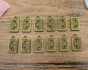 20 dijes de cinta de casete, tono bronce antiguo, doble cara - RS151