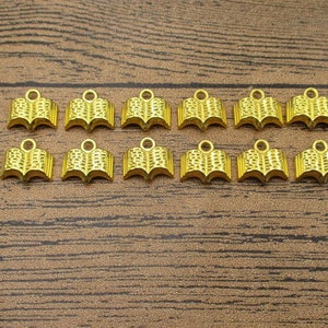 20 öppna bokberlocker, guldfärgade - RS150