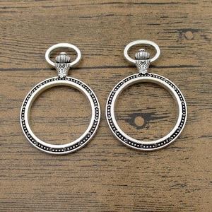 2 colgantes con bisel redondo de 30 mm, marco de medallón, tono plata antigua (sin cristal) - TS061
