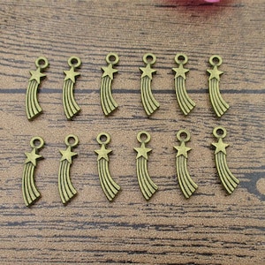 20 Sternschnuppen Charms, antike Bronzefarbe, doppelseitig-RS815