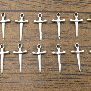 50 Little Sword Charms,Antique Silver Tone-RS684