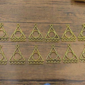 12 connettori triangolari Five To One color oro antico - RS1308