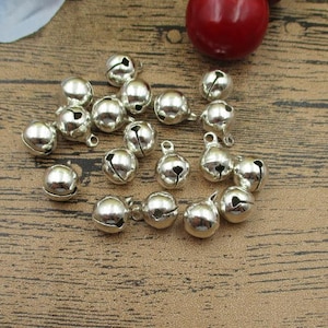 50 Round Silver Bell Charms-10mm-RS671