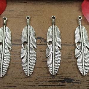 8 Feather Charms Antique Silver Tone-RS357