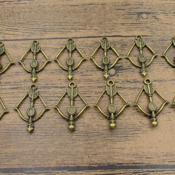 12 Bow And Arrow Charms, Antique Bronze Tone-RS377