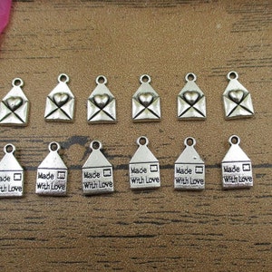30 amor envolvente encantos, tono plata antigua-RS439