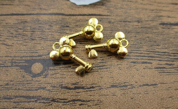ゴールドミッキーキーチャーム100個：金属合金ペンダント（20mm
