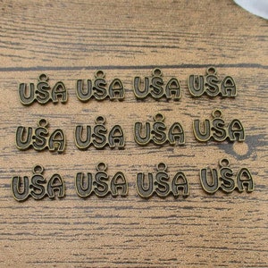 20 pingentes americanos, tom bronze antigo - RS803