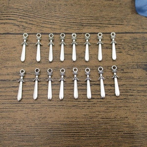 20 Little Sword Charms,Antique Silver Tone-RS975