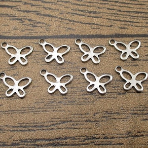 8 pequenos amuletos de borboleta de aço inoxidável-SS1021