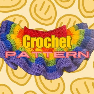 May include: A rainbow crochet skirt with a ruffled edge. The skirt is made with a variety of colors, including red, orange, yellow, green, blue, and purple. The text "Crochet Pattern" is written in yellow letters on the skirt.
