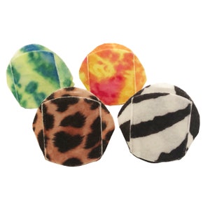 May include: Four fabric eye patches in different patterns: green and blue tie-dye, orange and red tie-dye, leopard print, and zebra print.