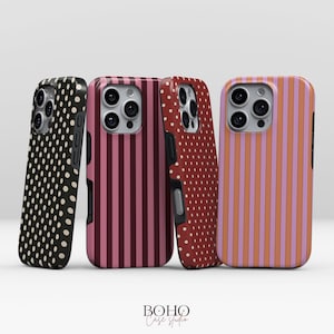 May include: Four smartphone cases featuring distinct patterns: a black case with white polka dots, a dark pink and maroon striped case, a red case with white polka dots, and an orange and light purple striped case. The text BOHO Case Studio is visible.